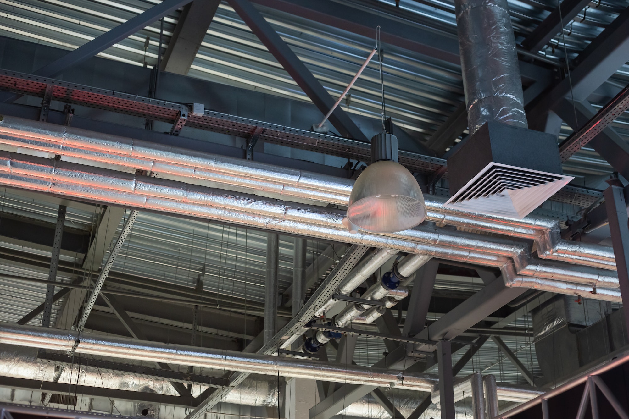 Supply grille for industrial ventilation in an office building under the ceiling, hvac